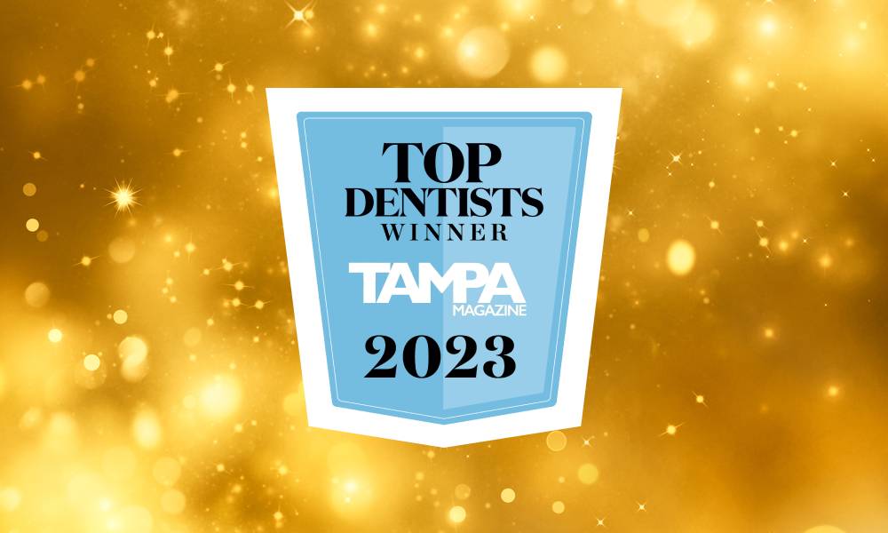 Top dentists winner Tampa 2023 poster with glowing background